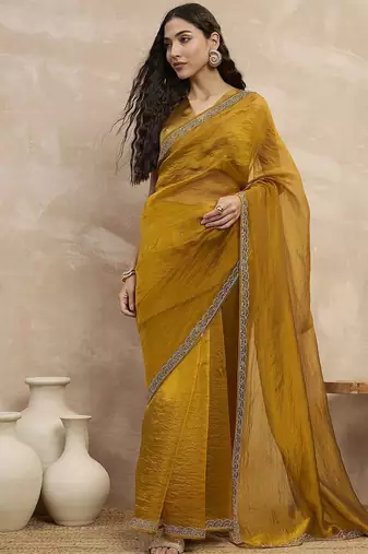Mustard embellished beads and stones border saree