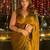 Olive embellished beads and stones tissue saree