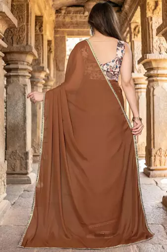 Brown saree with embellished mirror work border & unstitched blouse