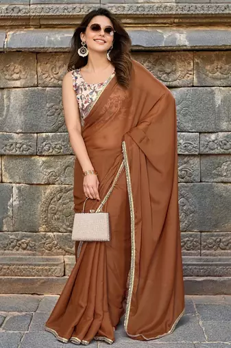 Brown saree with embellished mirror work border & unstitched blouse