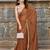 Brown saree with embellished mirror work border & unstitched blouse