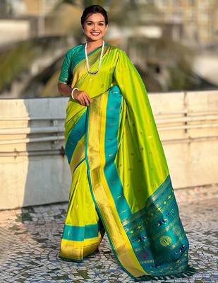 Green woven design zari silk blend paithani saree 2