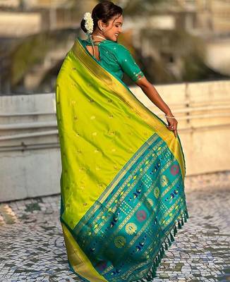 Green woven design zari silk blend paithani saree 3