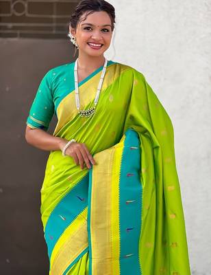 Green woven design zari silk blend paithani saree 4