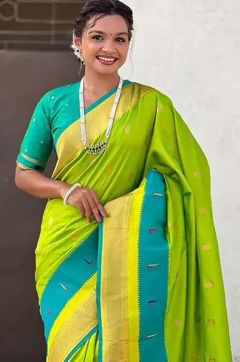 Green woven design zari silk blend paithani saree