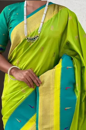 Green woven design zari silk blend paithani saree
