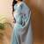 Sea green poly georgette saree