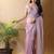 Pink woven design poly georgette saree