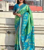 Green woven design zari silk blend patola saree