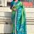 Green woven design zari silk blend patola saree