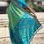 Green woven design zari silk blend patola saree