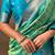 Green woven design zari silk blend patola saree