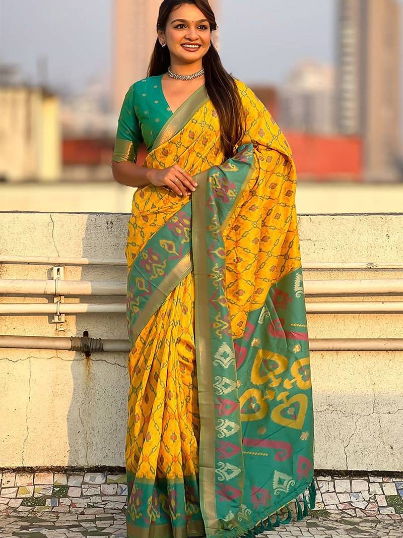 Yellow woven design zari silk blend patola saree