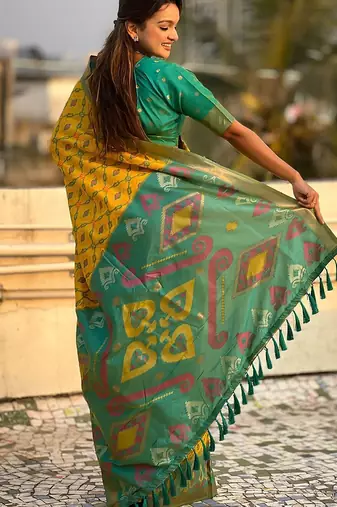 Yellow woven design zari silk blend patola saree