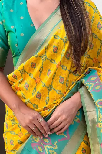 Yellow woven design zari silk blend patola saree
