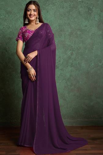 Purple sequinned border saree with heavy embroidered blouse piece