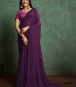 Purple sequinned border saree with heavy embroidered blouse piece