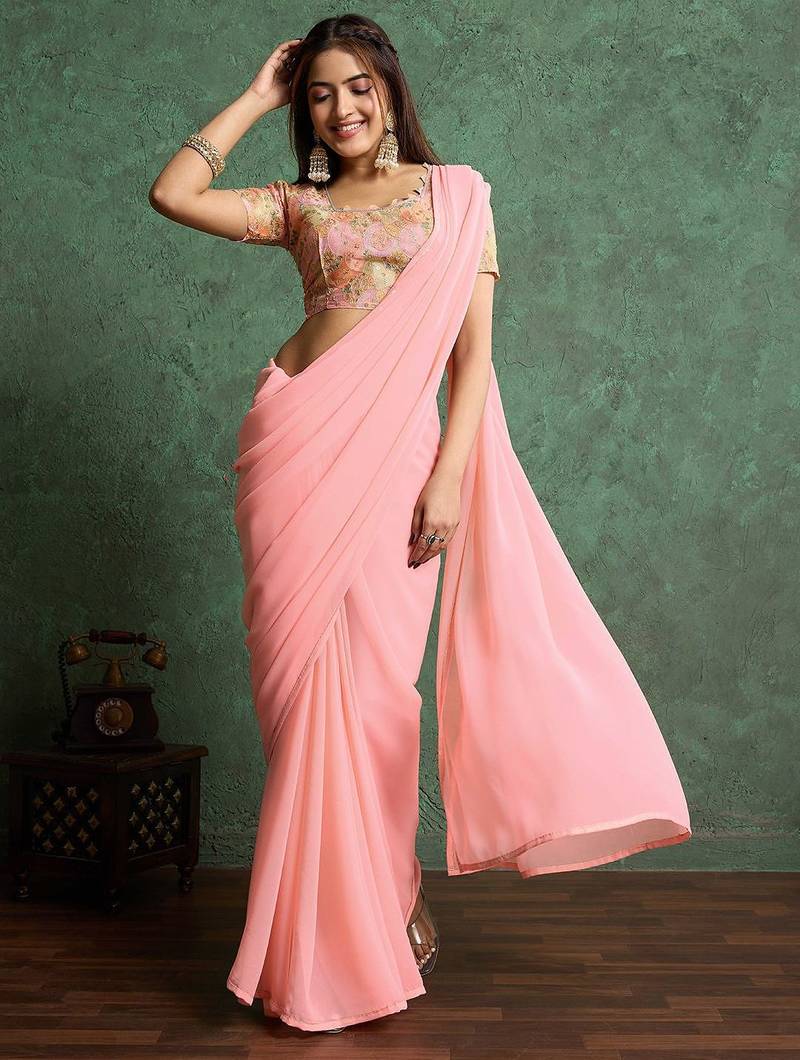 Pink solid pink saree with sequinned detail blouse piece