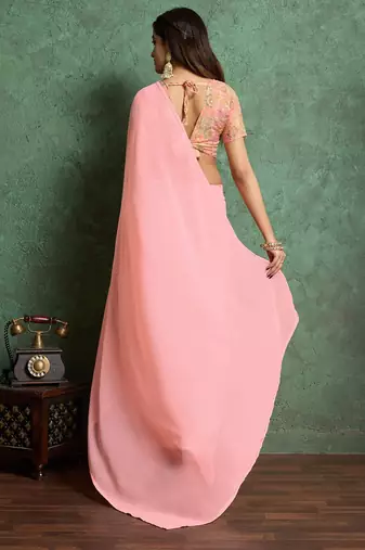 Pink solid pink saree with sequinned detail blouse piece