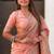 Peach woven design silk blend saree