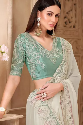 Off white ethnic motifs embroidered  georgette heavy work saree
