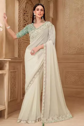 Off white ethnic motifs embroidered  georgette heavy work saree