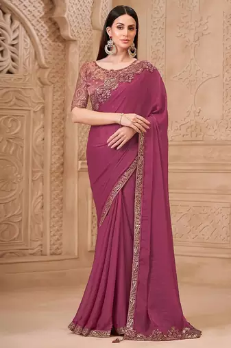 Purple ethnic motifs sequinned  georgette heavy work saree