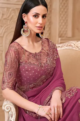 Purple ethnic motifs sequinned  georgette heavy work saree