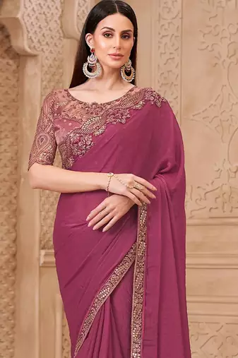 Purple ethnic motifs sequinned  georgette heavy work saree