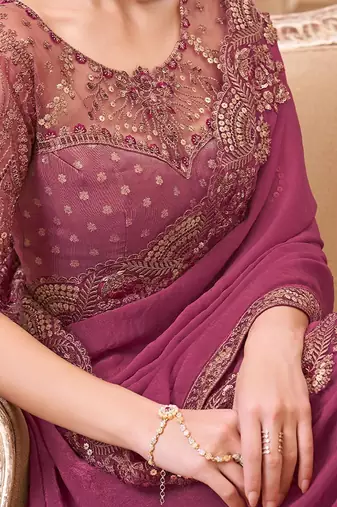 Purple ethnic motifs sequinned  georgette heavy work saree