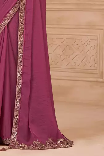 Purple ethnic motifs sequinned  georgette heavy work saree
