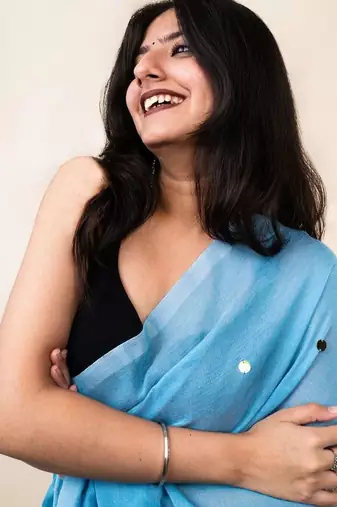 Turquoise embellished sequinned khadi saree
