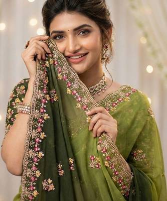 Green floral embroidered poly georgette designer saree 5