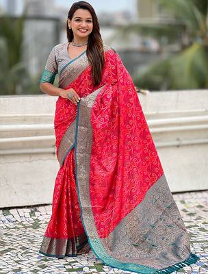Pink ethnic motifs woven design zari patola saree 1