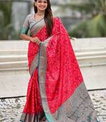 Pink ethnic motifs woven design zari patola saree