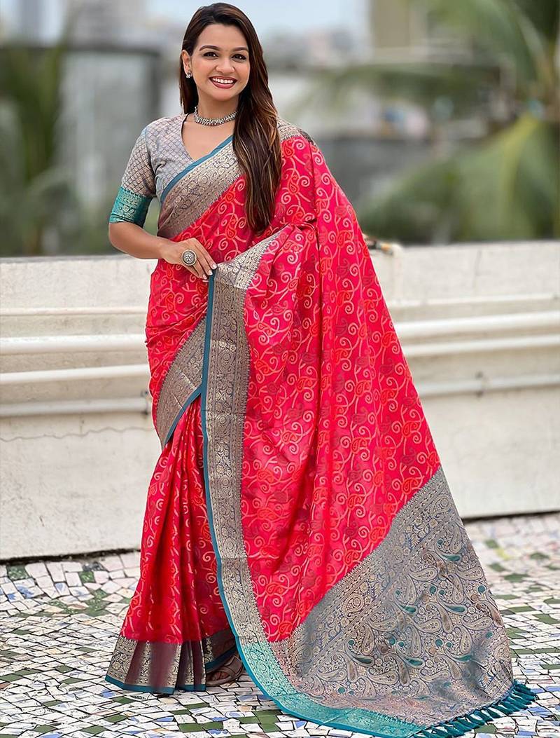 Pink ethnic motifs woven design zari patola saree