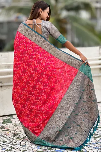 Pink ethnic motifs woven design zari patola saree