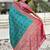 Blue paisley printed zari woven design boredr patola saree with blouse piece