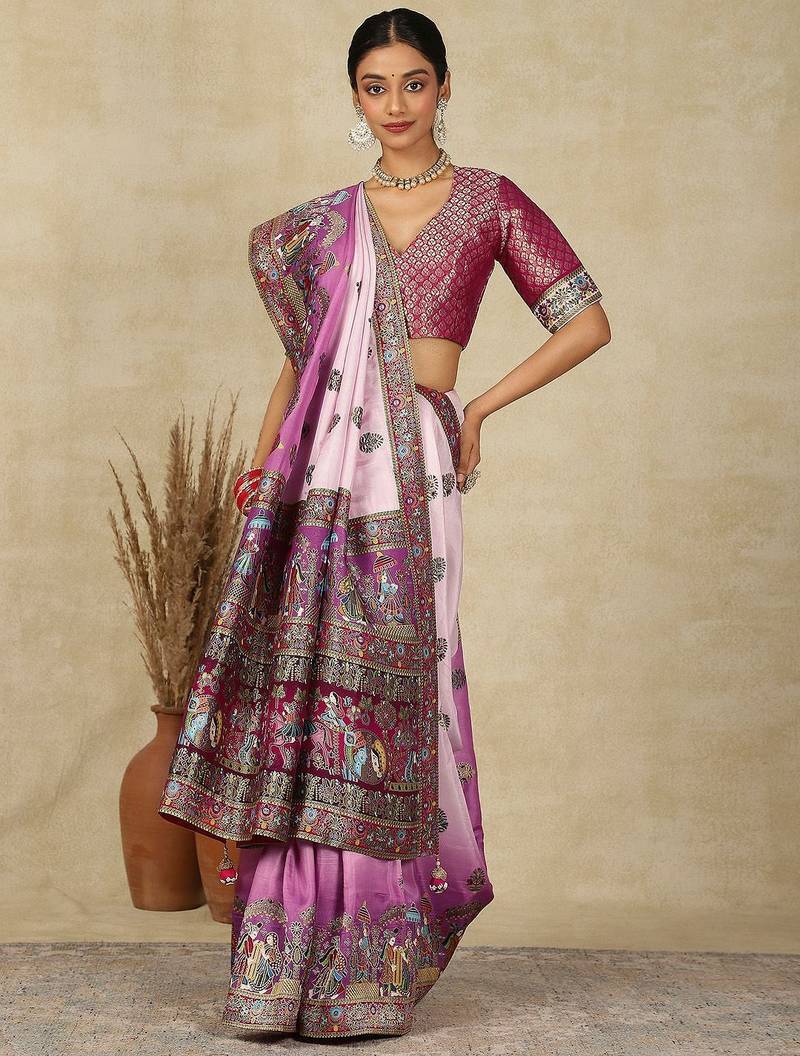 Mauve ethnic motifs woven design patola saree