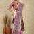 Mauve ethnic motifs woven design patola saree