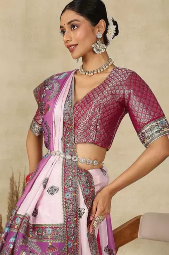 Mauve ethnic motifs woven design patola saree