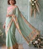 Sea green aari work poly chiffon saree