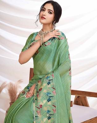 Green women aari work  chiffon saree 1