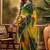 Green bandhani printed embellished beads and stones border saree