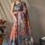 Orange kalamkari printed saree with blouse piece