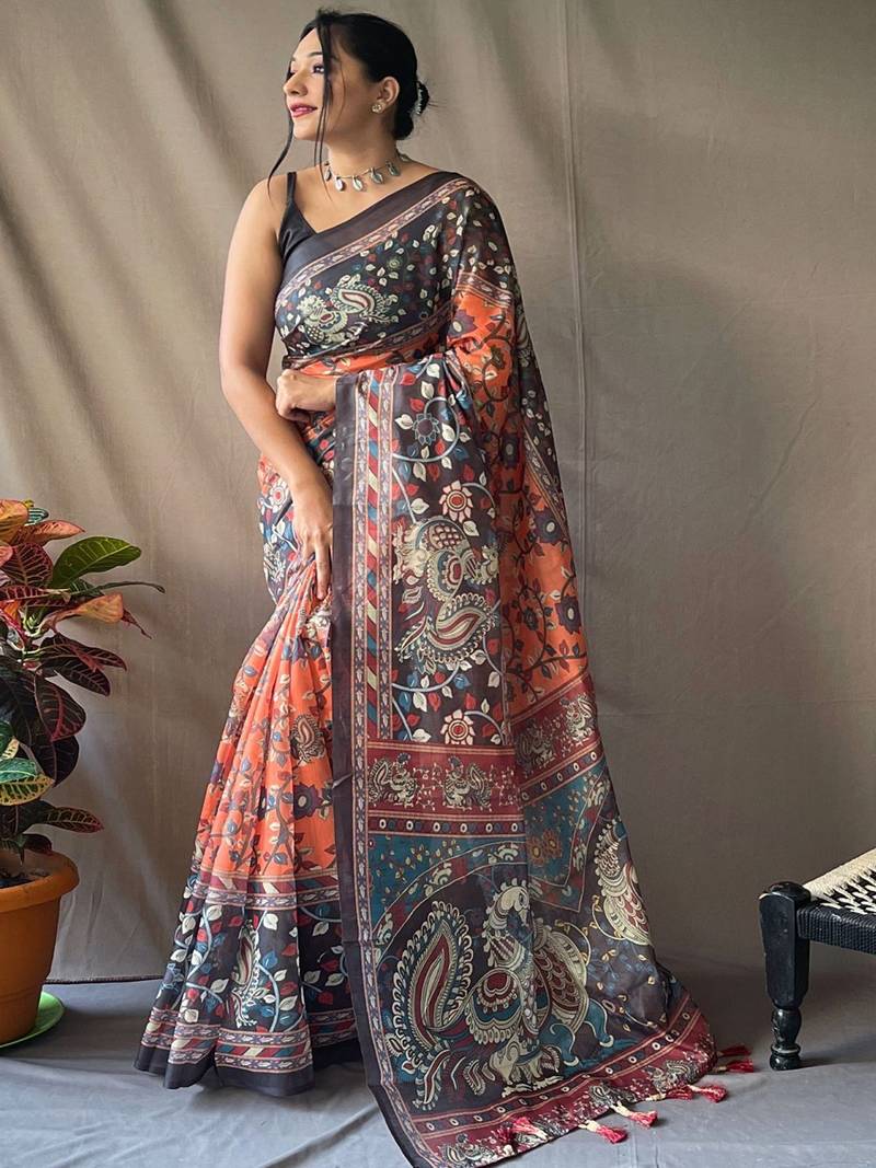 Orange kalamkari printed saree with blouse piece