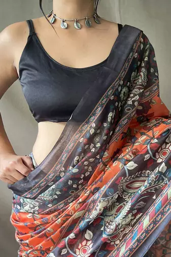 Orange kalamkari printed saree with blouse piece