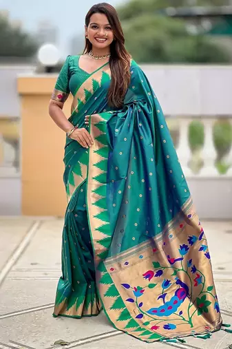 Green ethnic motifs woven design zari detail paithani saree