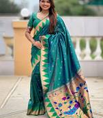 Green ethnic motifs woven design zari detail paithani saree