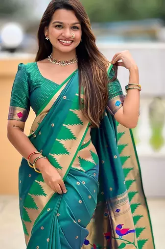 Green ethnic motifs woven design zari detail paithani saree